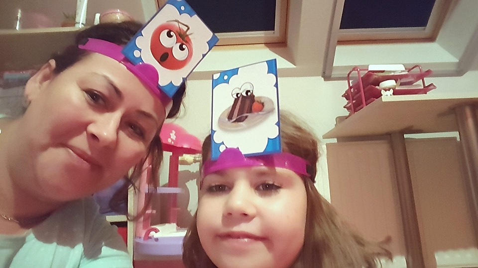 Krisztina and her niece Luca wearing headbands