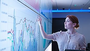 Woman explaining a graphic representation