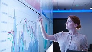 Woman explaining a graphic representation