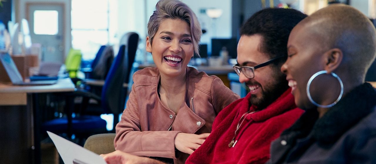 employees posing for a photo