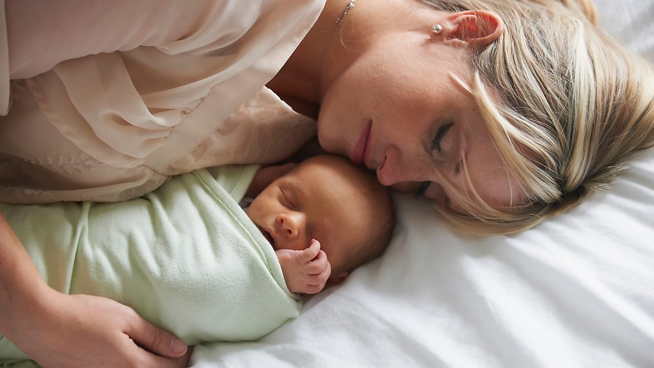 Mum and baby sleeping