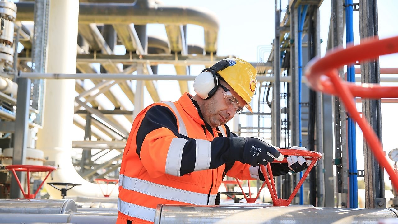 Engineer working on a pipeline