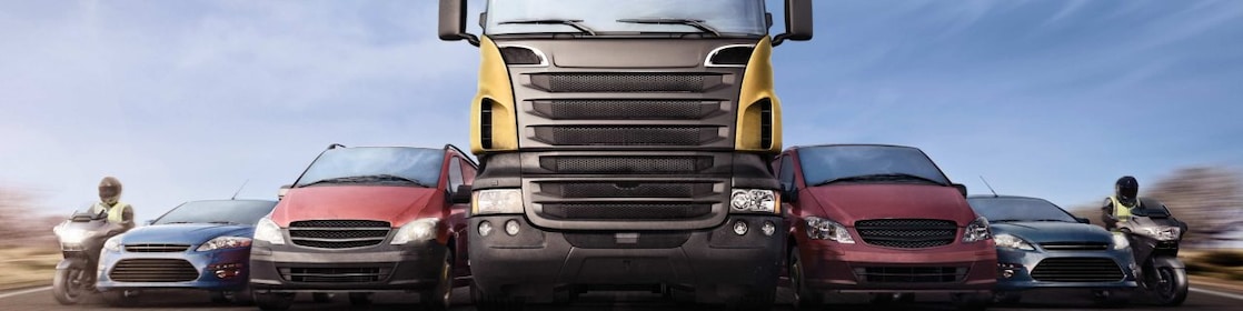 Cars and trucks in line on the road