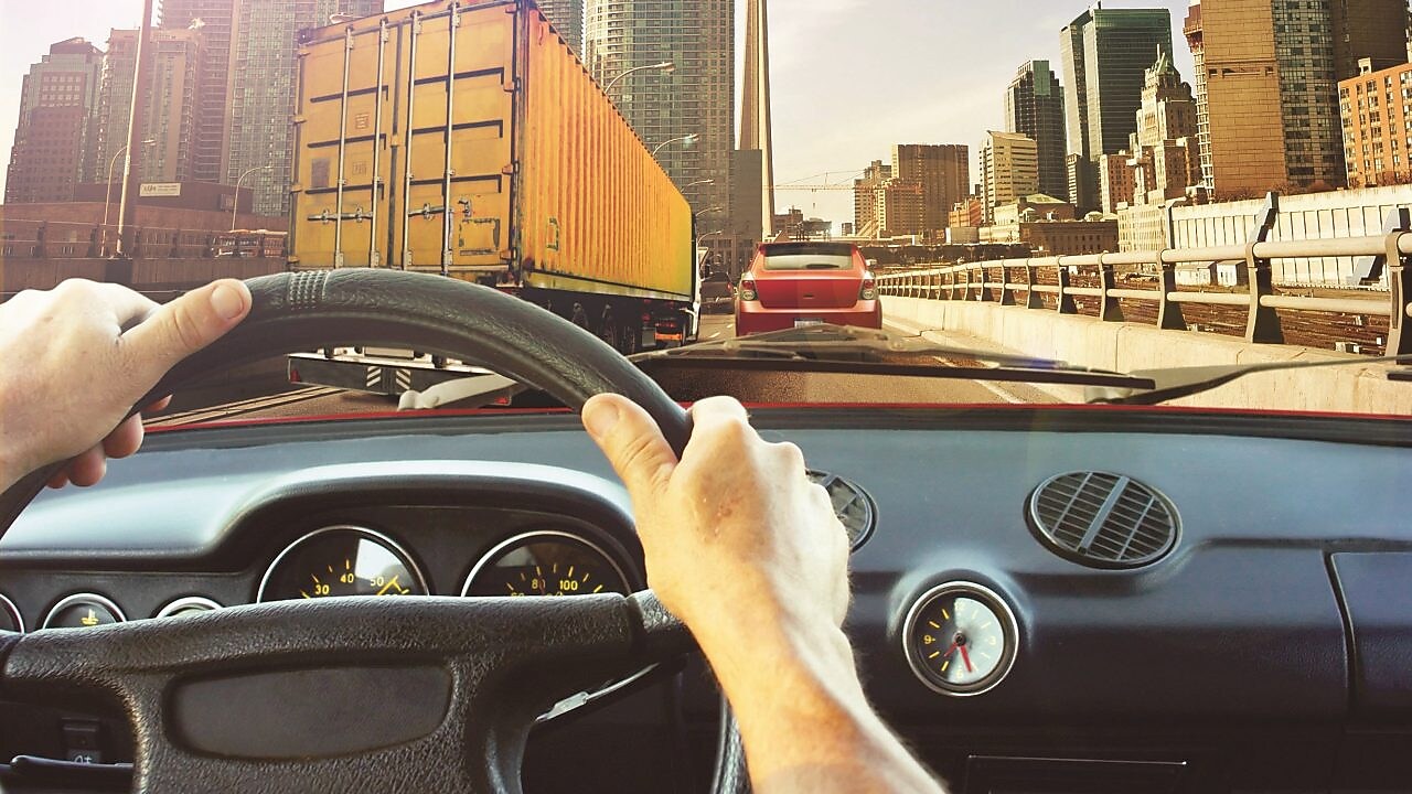 hand of worker with yellow hard-hat,natural light; Shutterstock ID 186660653; Purchase Order