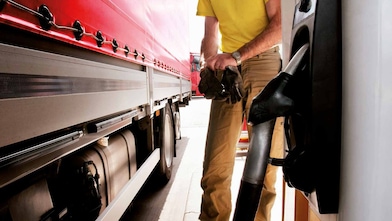 gloves focused with train background
