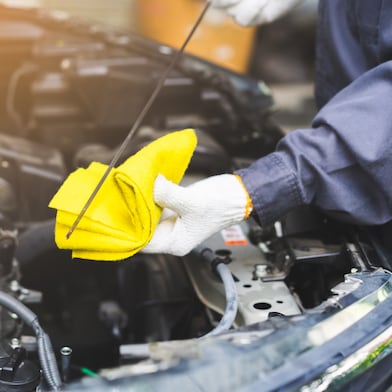 Mechanic fixing Car